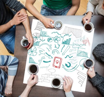 collaborative team brainstorming around table with 2026 09 25 02 33 07 utc
