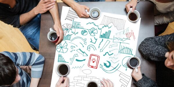 collaborative team brainstorming around table with 2026 09 25 02 33 07 utc