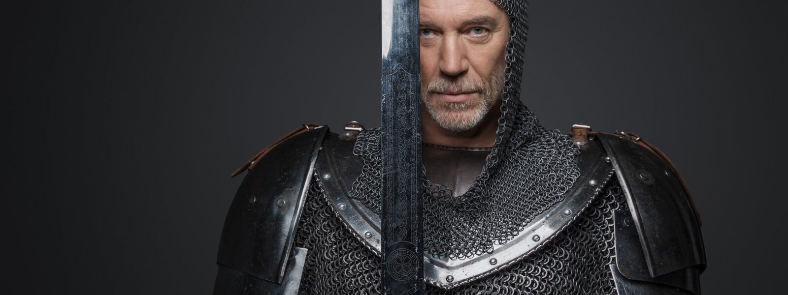 man in chainmail holding sword in studio 2026 09 23 03 25 12 utc