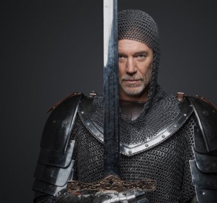 man in chainmail holding sword in studio 2026 09 23 03 25 12 utc